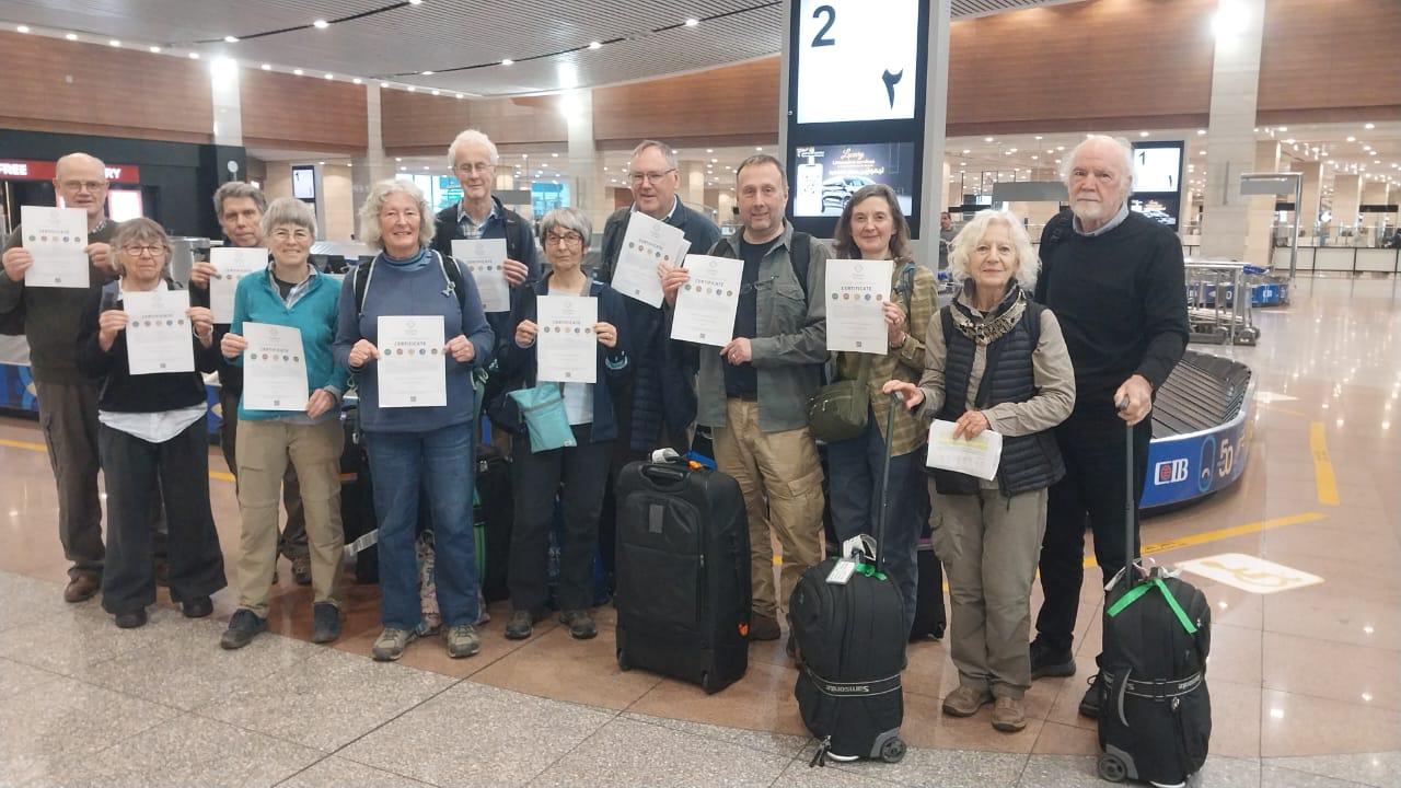Amisol travellers with sustainability certificates at Cairo airport