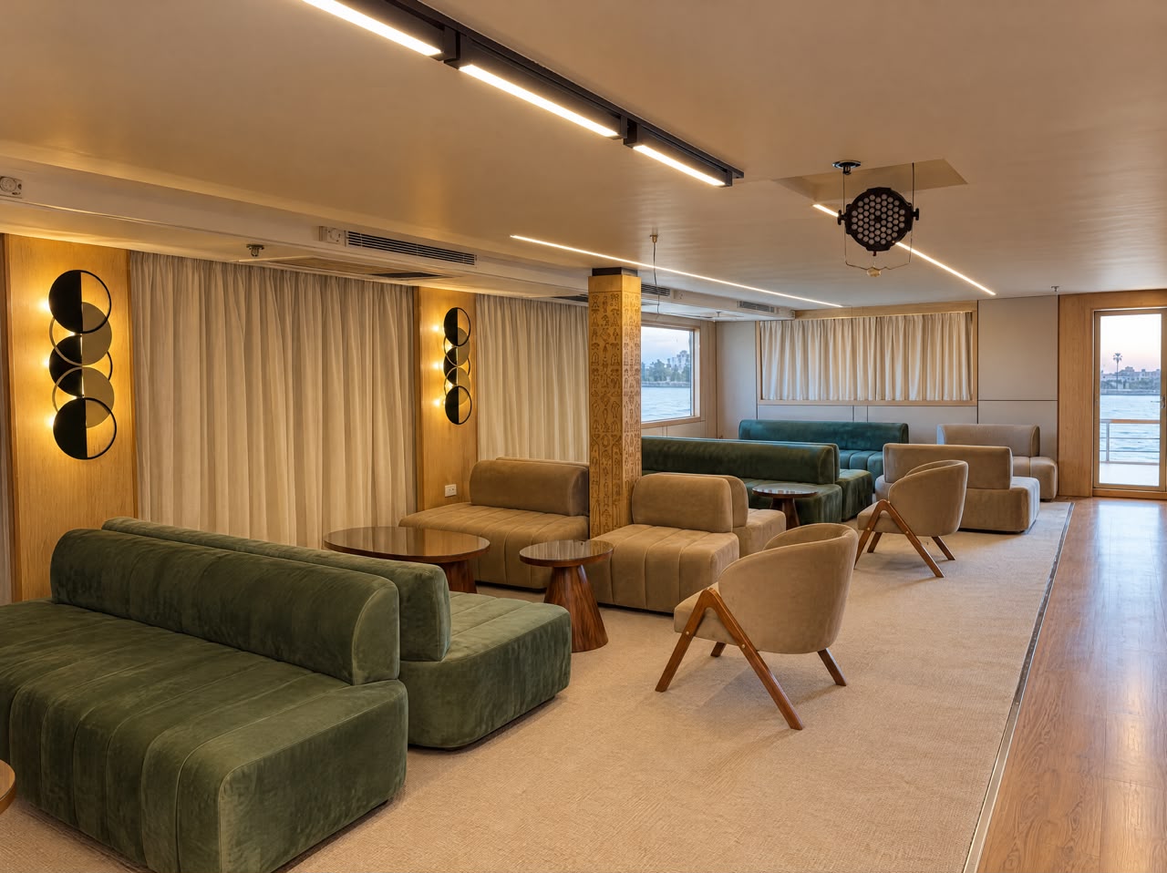 Moletnela lounge seating with hieroglyph column and Nile view through the window