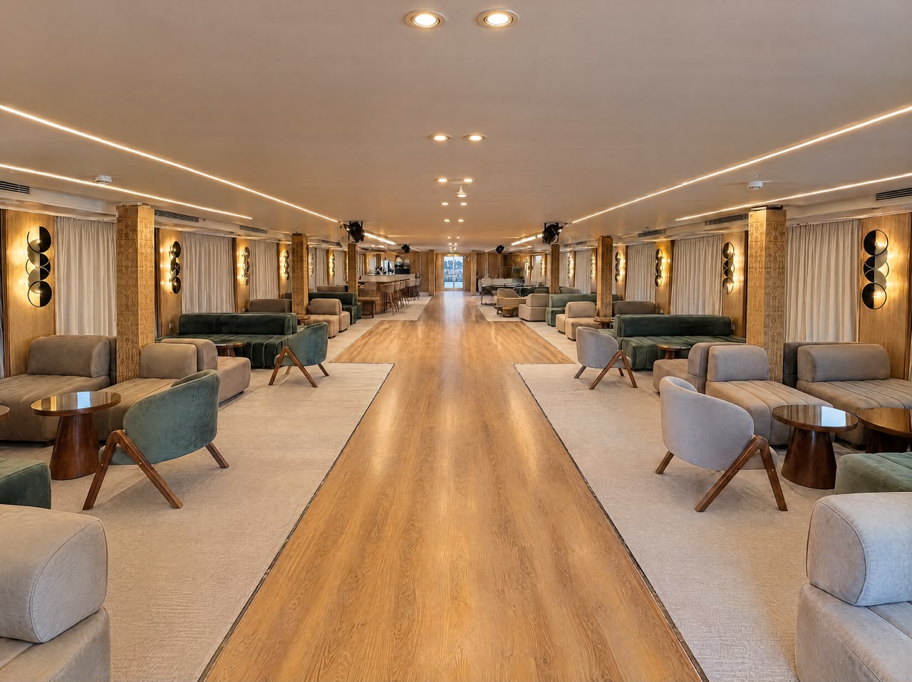 Moletnela lounge seen from the coffee bar end, velvet sofas along both walls