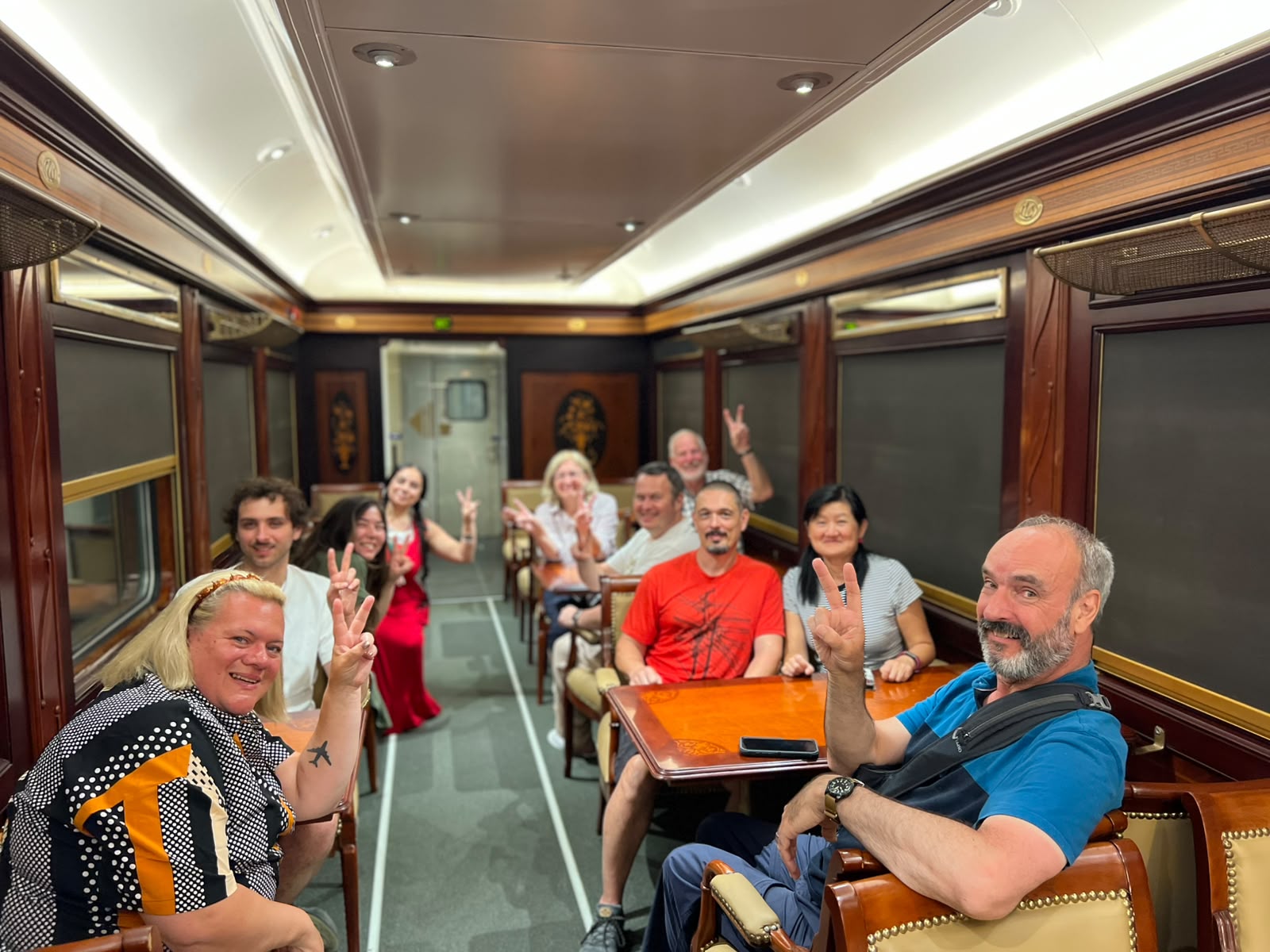 Guests in the restored lounge car of the Egypt sleeper train