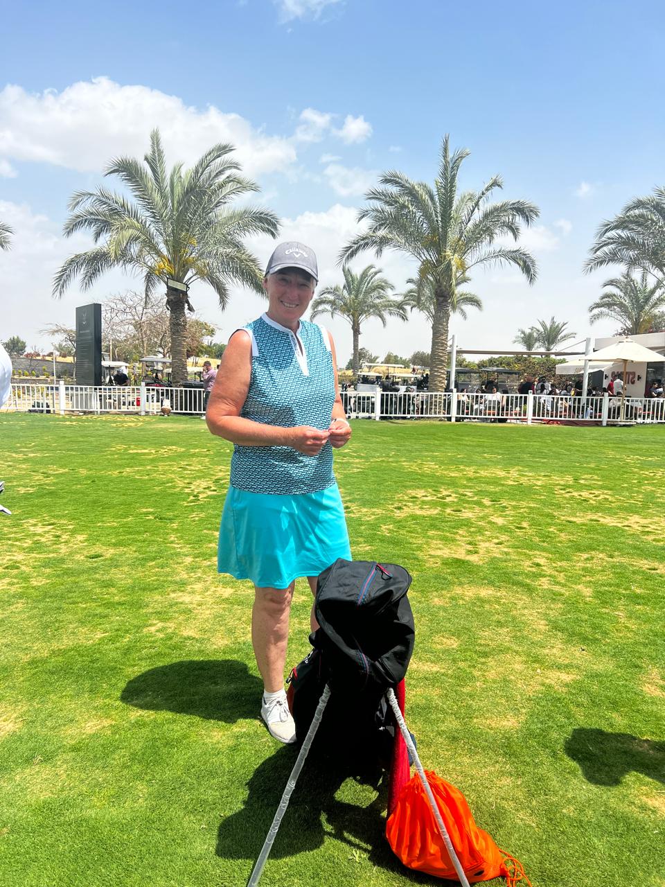 Golfer beside the clubhouse at a Red Sea resort in Egypt